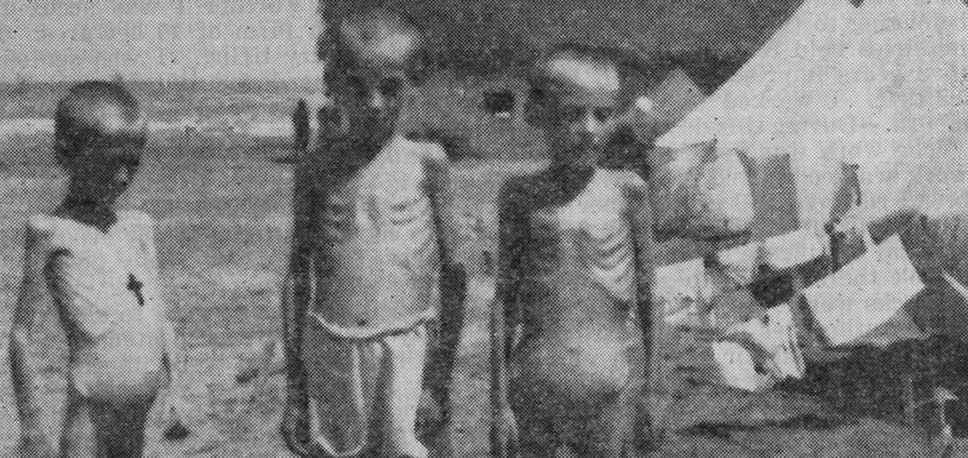 Three sisters, ages 7, 8, and 9, Polish evacuees from Russia, August 1942. Photo by Lt. Col. Szymanski, U.S. Army.